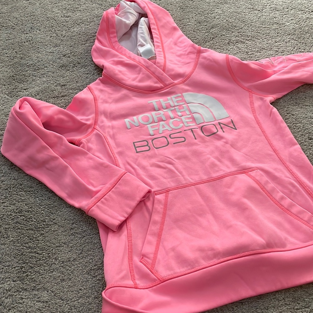 Pink north face Boston sweatshirt.